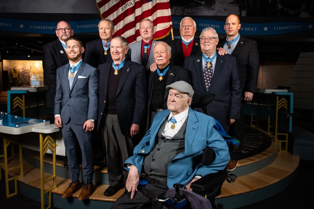 Image: Charles H. Coolidge (front) is joined by nine other recipients of the Medal of Honor during the dedication of the Charles H. Coolidge National Medal of Honor Heritage Center in Chattanooga, Tenn. on Feb. 22, 2020. Back row (L to R): Gary B. Beikirch, Patrick H. Brady, Sammy L. Davis, Michael E. Thornton, and Matthew O. Williams. Center row (L to R) Kyle Carpenter, Walter 