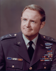 Male Soldier in uniform, head and shoulders, looking left. 